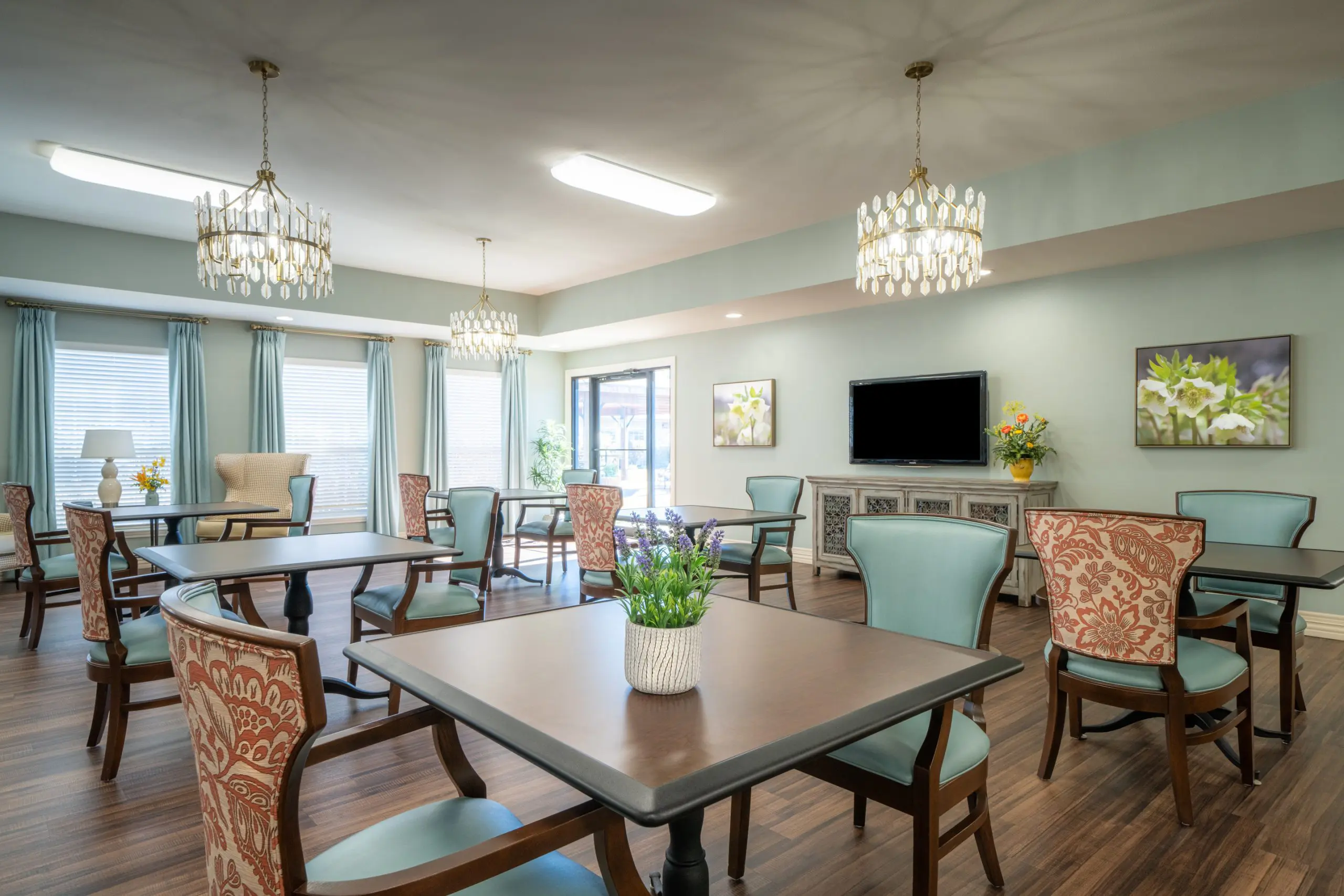 Open living space with TV and chairs